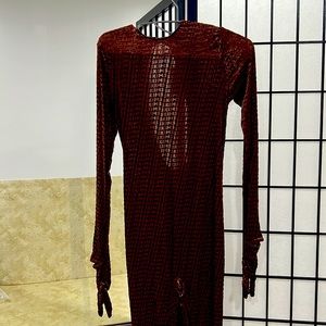 One piece chestnut brownSkims logo, attached hand coverings stirrup bottoms